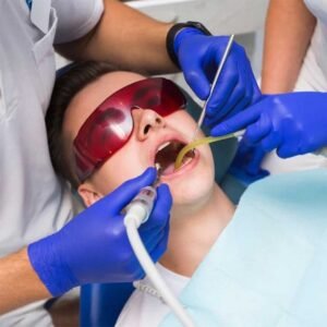 Does Medi-Cal cover root canals in Vista, CA, patient reviewing benefits at Alta Vista Dental